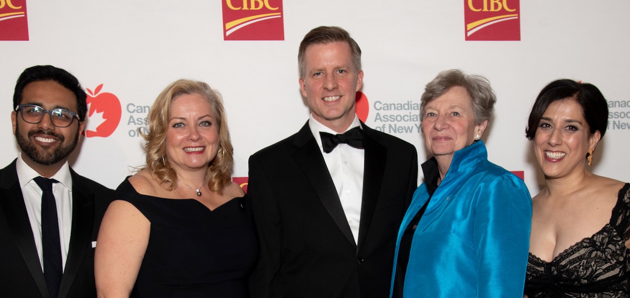 Dean Keyworth, President of the Canadian Assocation of New York, with others at a black tie event.
